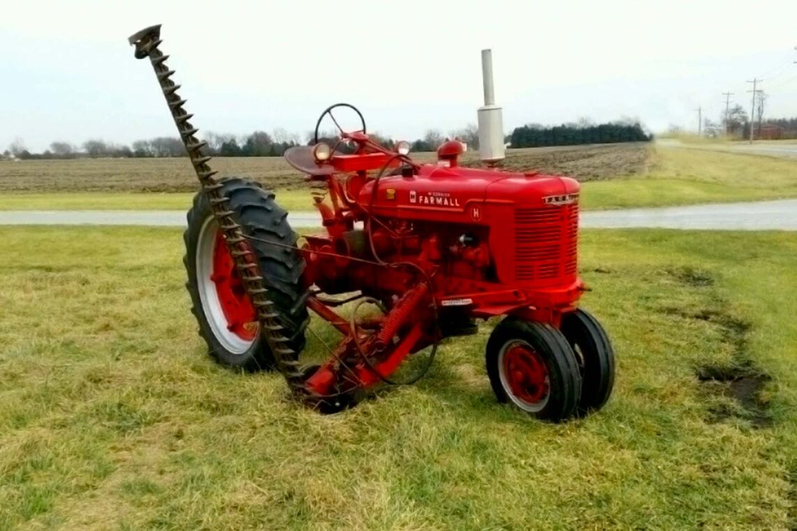 photo of red 1950s-era tractor