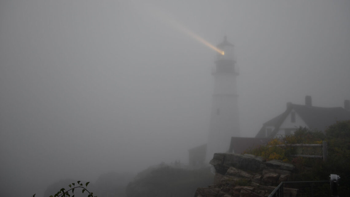 Photo of Portland Head Light in fog conditions