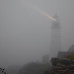 Photo of Portland Head Light in fog conditions